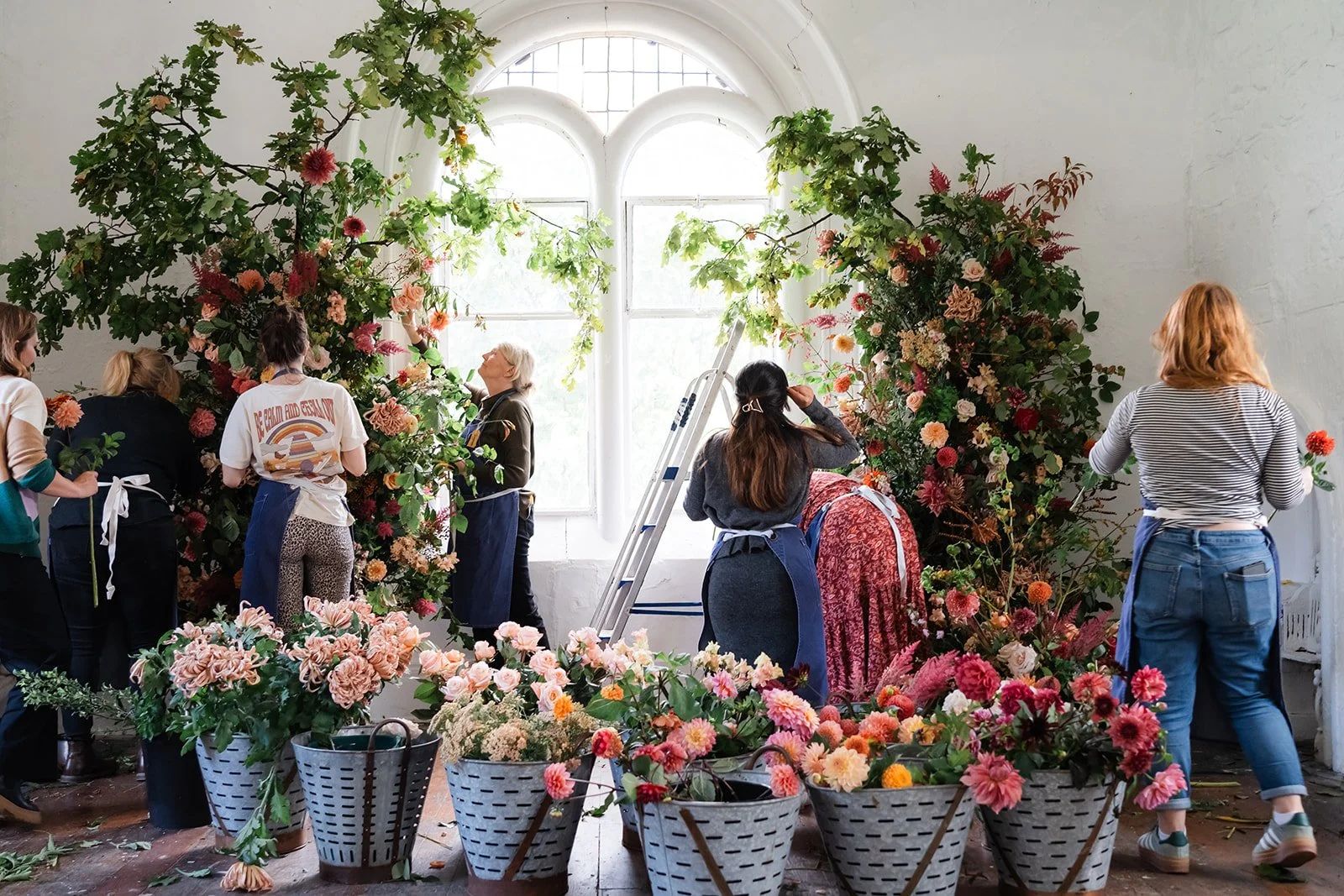Dedicated florist crafting an elegant wedding bouquet